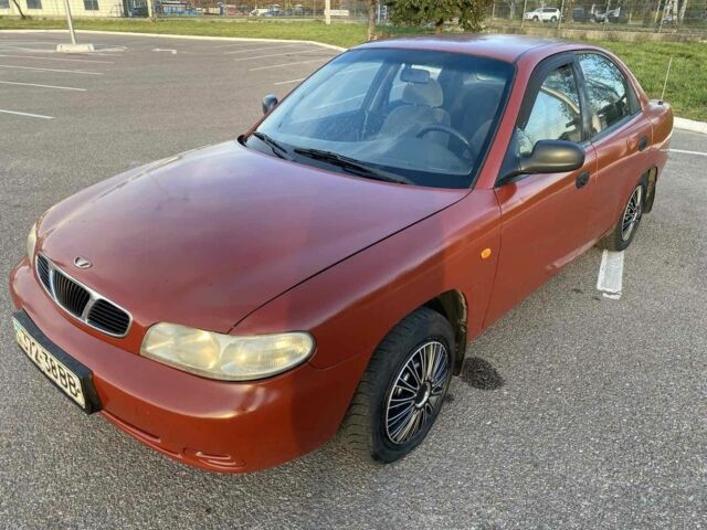 Красный Дэу Нубира, объемом двигателя 2 л и пробегом 300 тыс. км за 1100 $, фото 3 на Automoto.ua
