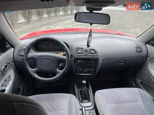 Червоний Деу Нубіра, об'ємом двигуна 1.6 л та пробігом 323 тис. км за 2400 $, фото 7 на Automoto.ua