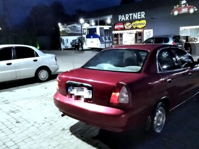 Красный Дэу Нубира, объемом двигателя 1.6 л и пробегом 155 тыс. км за 2000 $, фото 2 на Automoto.ua