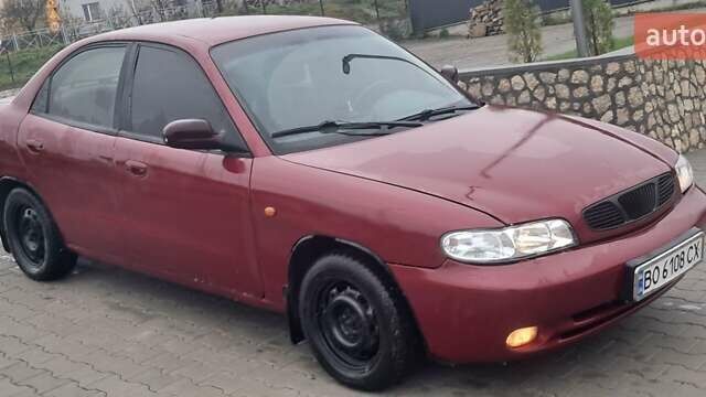 Красный Дэу Нубира, объемом двигателя 1.6 л и пробегом 200 тыс. км за 2655 $, фото 6 на Automoto.ua