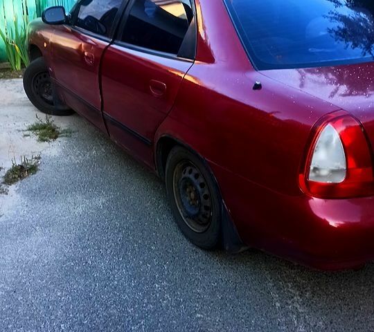 Червоний Деу Нубіра, об'ємом двигуна 1.6 л та пробігом 378 тис. км за 1100 $, фото 1 на Automoto.ua