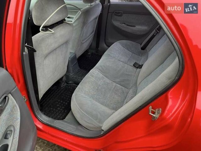 Червоний Деу Нубіра, об'ємом двигуна 1.6 л та пробігом 331 тис. км за 2350 $, фото 6 на Automoto.ua