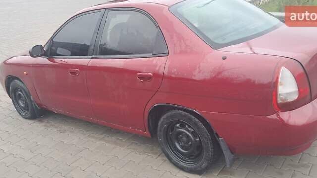 Красный Дэу Нубира, объемом двигателя 1.6 л и пробегом 200 тыс. км за 2655 $, фото 5 на Automoto.ua