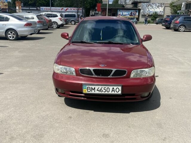 Красный Дэу Нубира, объемом двигателя 1.6 л и пробегом 300 тыс. км за 1500 $, фото 2 на Automoto.ua