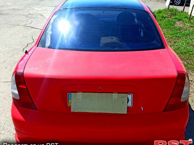 Красный Дэу Нубира, объемом двигателя 1.6 л и пробегом 195 тыс. км за 3500 $, фото 2 на Automoto.ua