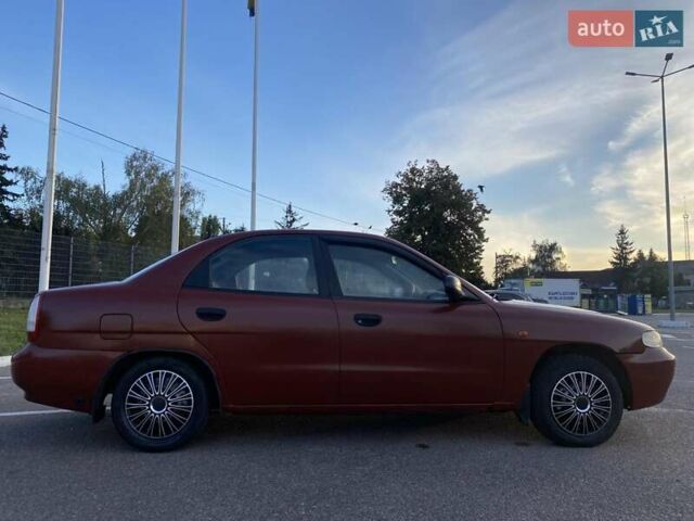 Червоний Деу Нубіра, об'ємом двигуна 2 л та пробігом 300 тис. км за 1100 $, фото 4 на Automoto.ua