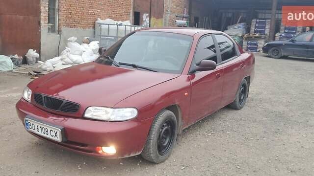 Красный Дэу Нубира, объемом двигателя 1.6 л и пробегом 200 тыс. км за 2655 $, фото 1 на Automoto.ua