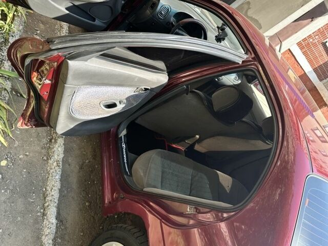 Красный Дэу Нубира, объемом двигателя 1.6 л и пробегом 284 тыс. км за 1600 $, фото 6 на Automoto.ua