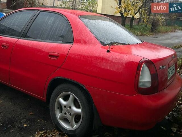 Червоний Деу Нубіра, об'ємом двигуна 1.6 л та пробігом 230 тис. км за 1100 $, фото 5 на Automoto.ua