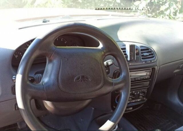 Червоний Деу Нубіра, об'ємом двигуна 1.6 л та пробігом 2 тис. км за 1500 $, фото 4 на Automoto.ua