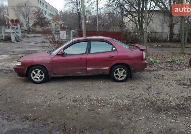 Червоний Деу Нубіра, об'ємом двигуна 1.6 л та пробігом 300 тис. км за 1200 $, фото 4 на Automoto.ua