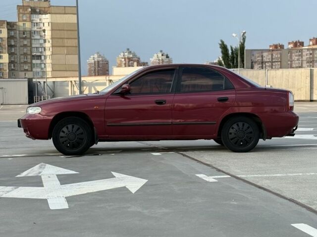Красный Дэу Нубира, объемом двигателя 1.6 л и пробегом 234 тыс. км за 1650 $, фото 6 на Automoto.ua