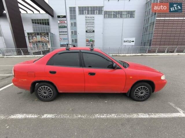 Червоний Деу Нубіра, об'ємом двигуна 1.6 л та пробігом 136 тис. км за 3000 $, фото 1 на Automoto.ua