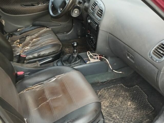 Красный Дэу Нубира, объемом двигателя 0 л и пробегом 450 тыс. км за 1200 $, фото 7 на Automoto.ua