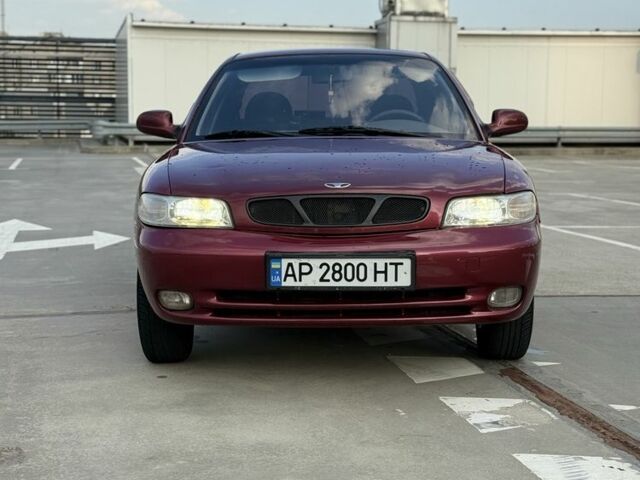 Красный Дэу Нубира, объемом двигателя 1.6 л и пробегом 234 тыс. км за 1650 $, фото 1 на Automoto.ua