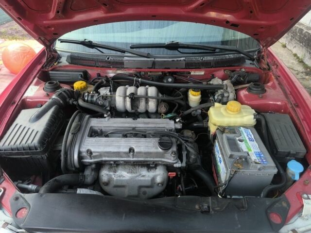 Красный Дэу Нубира, объемом двигателя 1.6 л и пробегом 330 тыс. км за 1100 $, фото 7 на Automoto.ua