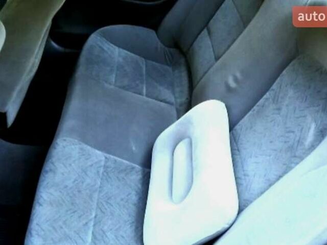 Красный Дэу Нубира, объемом двигателя 1.6 л и пробегом 160 тыс. км за 2000 $, фото 3 на Automoto.ua