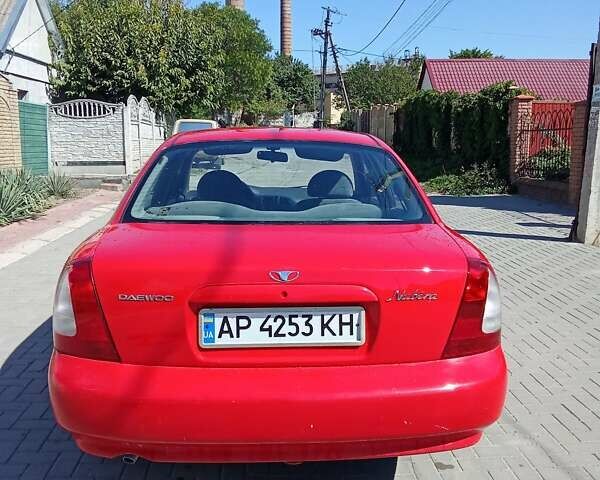 Красный Дэу Нубира, объемом двигателя 1.6 л и пробегом 320 тыс. км за 1700 $, фото 8 на Automoto.ua
