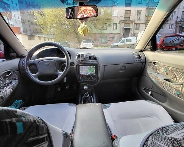 Червоний Деу Нубіра, об'ємом двигуна 1.6 л та пробігом 224 тис. км за 2850 $, фото 19 на Automoto.ua