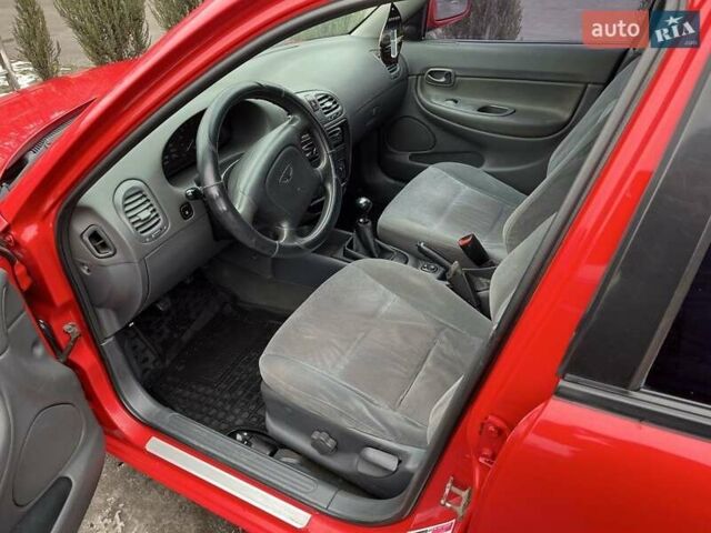 Червоний Деу Нубіра, об'ємом двигуна 1.6 л та пробігом 331 тис. км за 2350 $, фото 5 на Automoto.ua