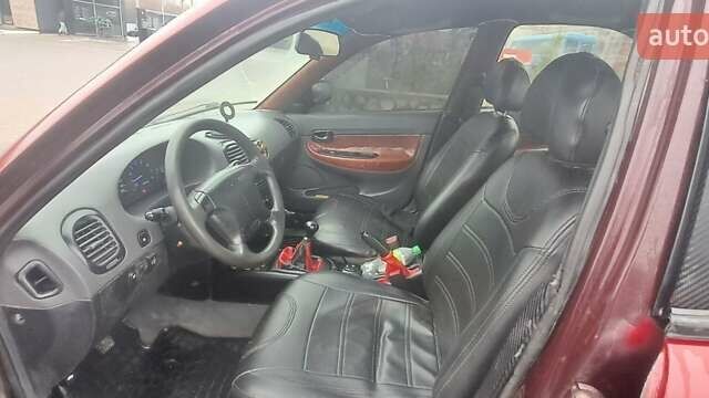 Красный Дэу Нубира, объемом двигателя 1.6 л и пробегом 200 тыс. км за 2655 $, фото 9 на Automoto.ua