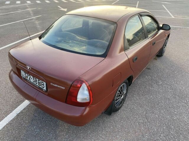 Красный Дэу Нубира, объемом двигателя 2 л и пробегом 300 тыс. км за 1100 $, фото 4 на Automoto.ua