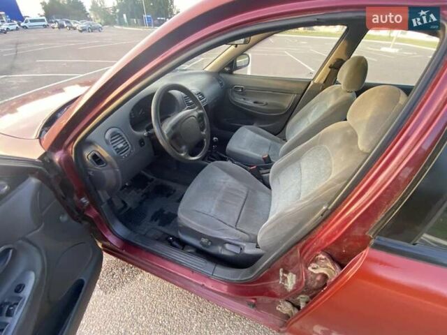Червоний Деу Нубіра, об'ємом двигуна 2 л та пробігом 300 тис. км за 1100 $, фото 16 на Automoto.ua