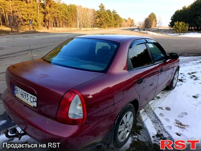 Червоний Деу Нубіра, об'ємом двигуна 1.6 л та пробігом 185 тис. км за 1350 $, фото 3 на Automoto.ua