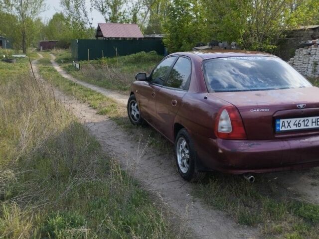 Красный Дэу Нубира, объемом двигателя 2 л и пробегом 200 тыс. км за 1100 $, фото 5 на Automoto.ua
