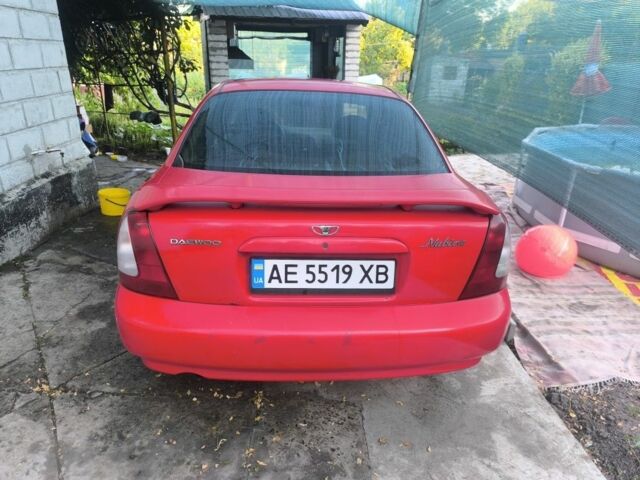 Красный Дэу Нубира, объемом двигателя 1.6 л и пробегом 330 тыс. км за 1100 $, фото 4 на Automoto.ua