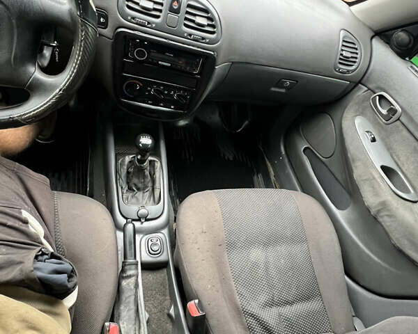 Червоний Деу Нубіра, об'ємом двигуна 1.6 л та пробігом 168 тис. км за 2200 $, фото 14 на Automoto.ua