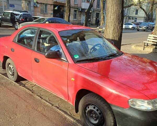 Красный Дэу Нубира, объемом двигателя 1.6 л и пробегом 153 тыс. км за 1800 $, фото 9 на Automoto.ua