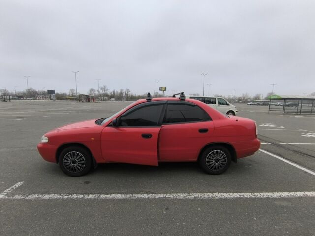 Красный Дэу Нубира, объемом двигателя 1.6 л и пробегом 136 тыс. км за 2700 $, фото 4 на Automoto.ua