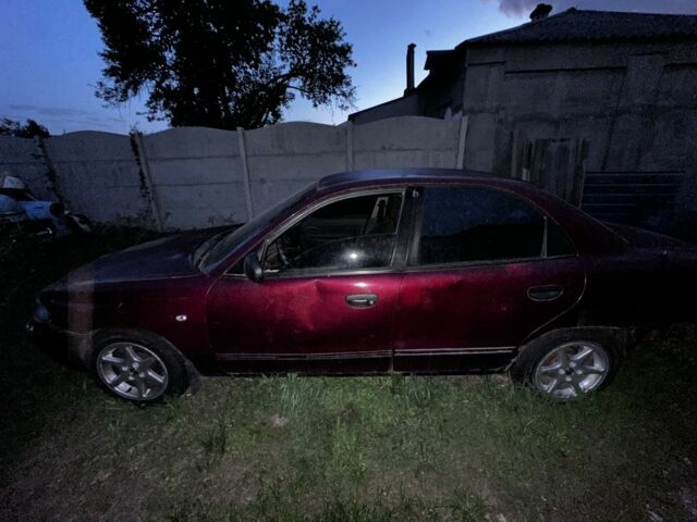 Червоний Деу Нубіра, об'ємом двигуна 1.6 л та пробігом 300 тис. км за 920 $, фото 8 на Automoto.ua