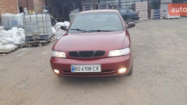 Красный Дэу Нубира, объемом двигателя 1.6 л и пробегом 200 тыс. км за 2655 $, фото 2 на Automoto.ua