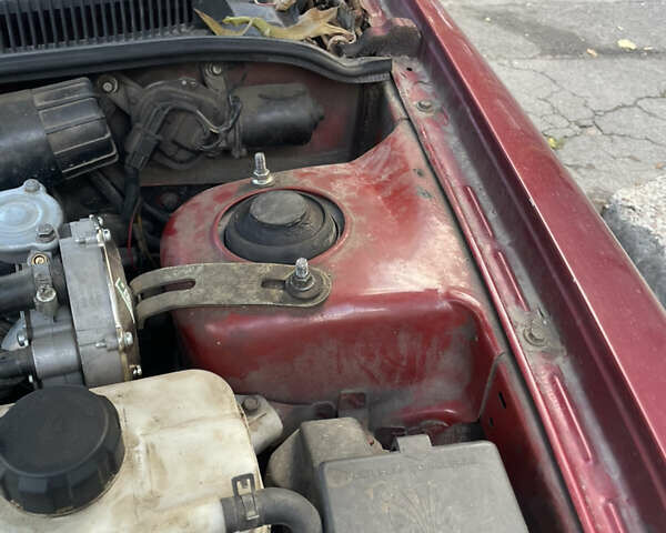 Деу Нубіра 1998 у Києві на Automoto.ua Червоний Деу Нубіра, об'ємом двигуна 1.6 л та пробігом 100 тис. км за 1500 $, фото 8 на Automoto.ua