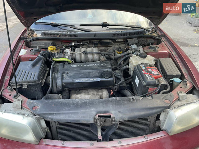 Деу Нубіра 1998 у Києві на Automoto.ua Червоний Деу Нубіра, об'ємом двигуна 1.6 л та пробігом 100 тис. км за 1500 $, фото 9 на Automoto.ua