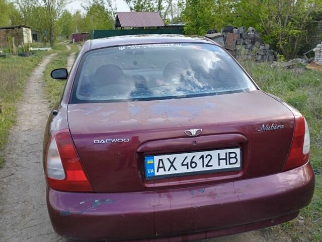 Красный Дэу Нубира, объемом двигателя 2 л и пробегом 200 тыс. км за 1100 $, фото 1 на Automoto.ua