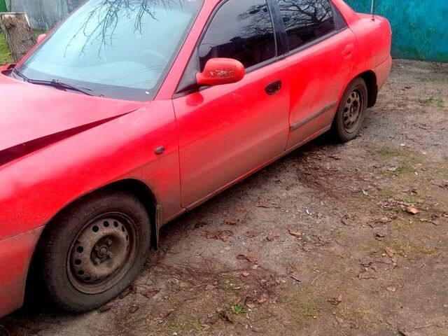 Червоний Деу Нубіра, об'ємом двигуна 1.6 л та пробігом 0 тис. км за 710 $, фото 1 на Automoto.ua