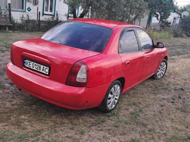 Красный Дэу Нубира, объемом двигателя 1.6 л и пробегом 37 тыс. км за 1400 $, фото 6 на Automoto.ua
