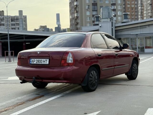 Красный Дэу Нубира, объемом двигателя 1.6 л и пробегом 234 тыс. км за 1650 $, фото 3 на Automoto.ua