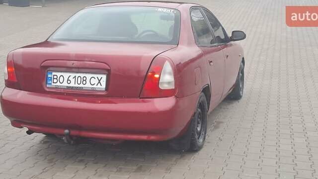 Красный Дэу Нубира, объемом двигателя 1.6 л и пробегом 200 тыс. км за 2655 $, фото 4 на Automoto.ua