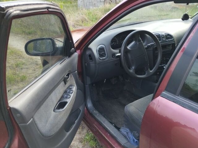 Красный Дэу Нубира, объемом двигателя 2 л и пробегом 200 тыс. км за 1100 $, фото 2 на Automoto.ua