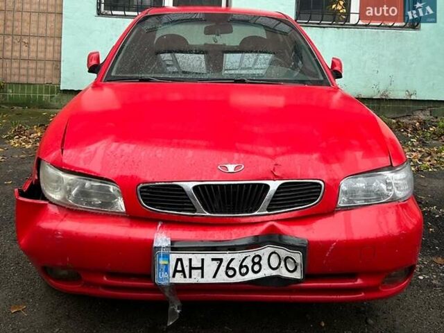 Червоний Деу Нубіра, об'ємом двигуна 1.6 л та пробігом 230 тис. км за 1100 $, фото 1 на Automoto.ua