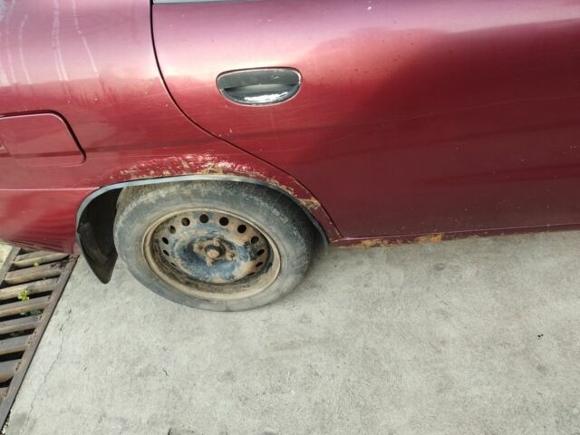 Красный Дэу Нубира, объемом двигателя 0 л и пробегом 450 тыс. км за 1200 $, фото 2 на Automoto.ua