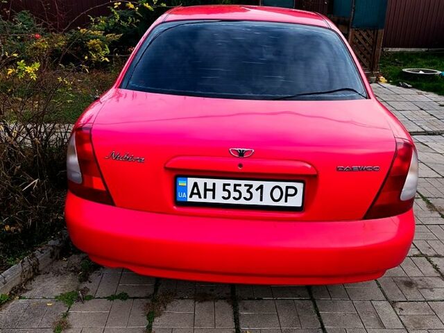 Красный Дэу Нубира, объемом двигателя 1.6 л и пробегом 183 тыс. км за 2500 $, фото 3 на Automoto.ua