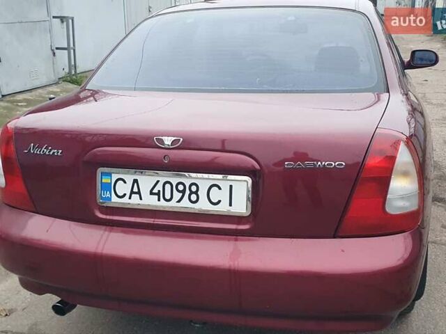 Красный Дэу Нубира, объемом двигателя 1.6 л и пробегом 275 тыс. км за 3700 $, фото 11 на Automoto.ua