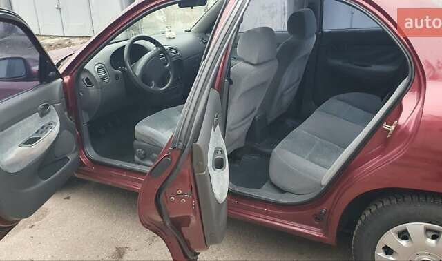 Красный Дэу Нубира, объемом двигателя 1.6 л и пробегом 275 тыс. км за 3700 $, фото 4 на Automoto.ua
