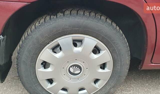 Красный Дэу Нубира, объемом двигателя 1.6 л и пробегом 275 тыс. км за 3700 $, фото 8 на Automoto.ua