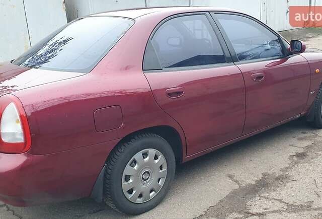 Красный Дэу Нубира, объемом двигателя 1.6 л и пробегом 275 тыс. км за 3700 $, фото 10 на Automoto.ua